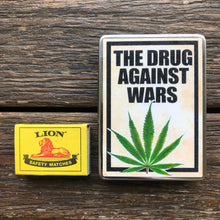 Load image into Gallery viewer, Tintopia Hold-All Tin - The Drug Against Wars - Phoenix Menswear